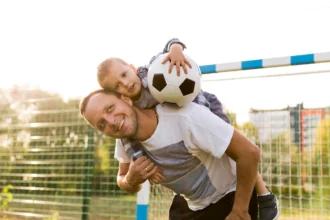 Fatherhood and Sports: Teaching Values and Building Character